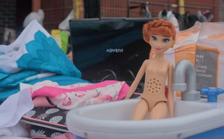 Doll in bath
