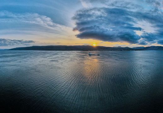 Passing by the cloch light at sunset